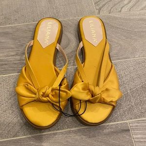 Women’s yellow satin sandals
